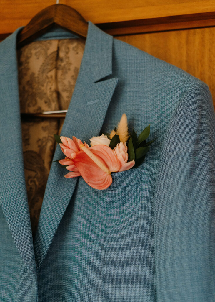 Roma Tailors custom suit for tropical wedding in Costa Rica, with flower in pocket