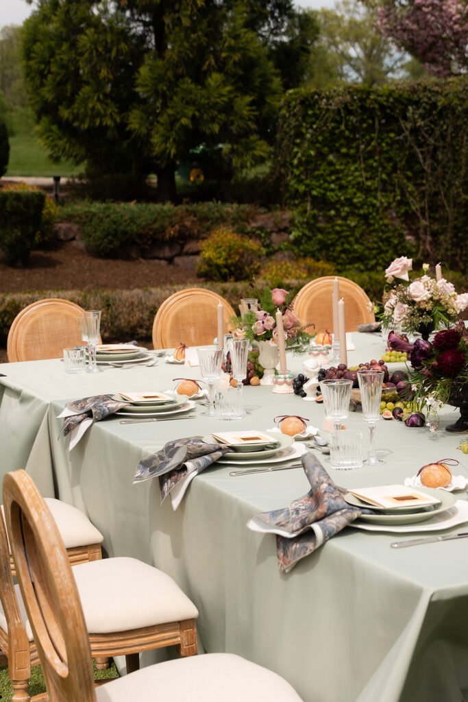 european tablescape with light green, and decadent settings shot by editorial wedding duo young plant weddings