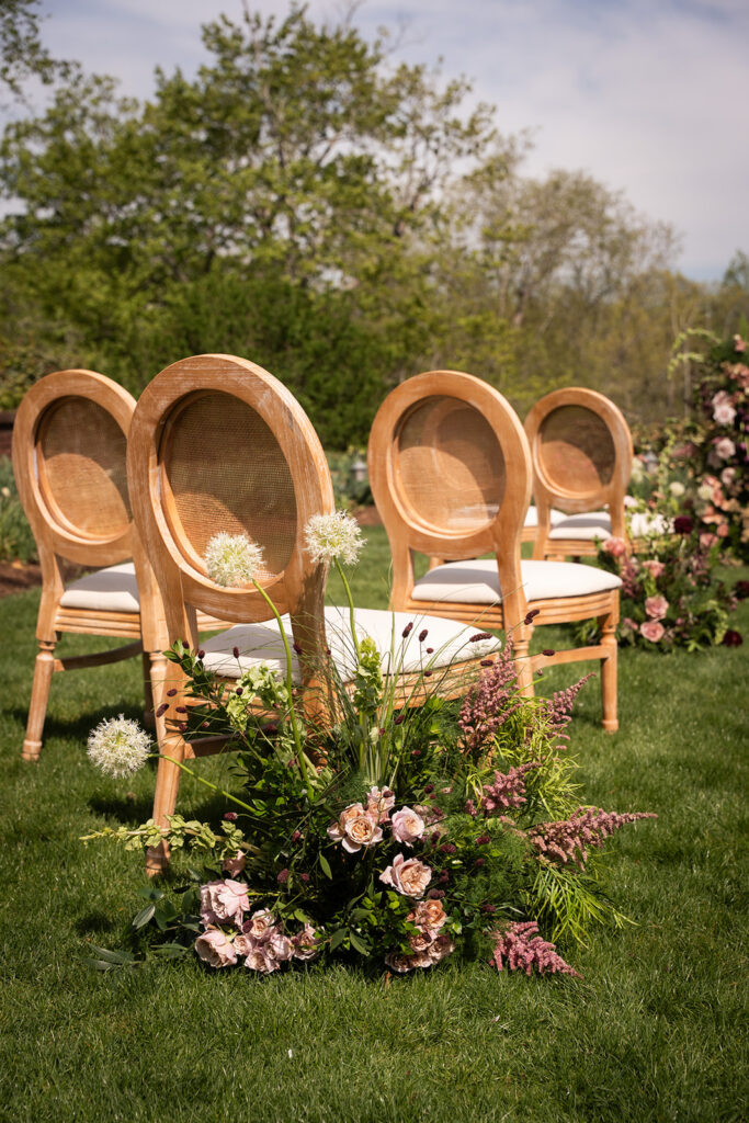 louise chairs setup for ceremony in european inspired wedding editorial